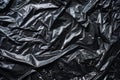 Image of Crumpled sheet of black polythene plastic wrap. Texture for background usage Royalty Free Stock Photo