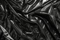 Image of Crumpled sheet of black polythene plastic wrap. Texture for background usage Royalty Free Stock Photo