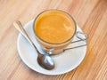 Image of cup of fresh coffee cortado on table Royalty Free Stock Photo