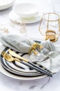 Image of cutlery sets with plate, cup and candle. Party theme, place and table setting Royalty Free Stock Photo