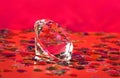 image of damond on red background close-up Royalty Free Stock Photo