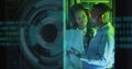 Image of data processing and binary coding over diverse it engineers and computer servers Royalty Free Stock Photo