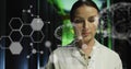 Image of data processing with brains over caucasian female scientist in server room Royalty Free Stock Photo