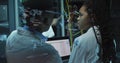Image of data processing over diverse it technicians by computer servers Royalty Free Stock Photo