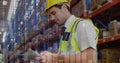 Image of data processing over man working in warehouse Royalty Free Stock Photo