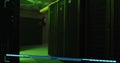 Image of data processing and text over green lights of computer server Royalty Free Stock Photo