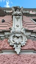 An image of a decorative stucco plaster element on the facade of a histirical building Royalty Free Stock Photo