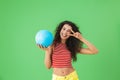 Image of delighted woman 20s wearing summer clothes smiling and holding volley ball Royalty Free Stock Photo