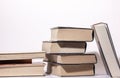 image depicting a pile of reading books,