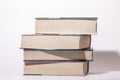 image depicting a pile of reading books,