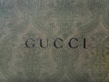 abstract background of the gucci inscription with decorations