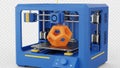 Blue 3d printer creating an orange octahedron isolated on white background Royalty Free Stock Photo