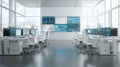 A modern office space with multiple computer workstations and large screens on the wall for monitoring and data analysis Royalty Free Stock Photo