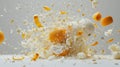 A vibrant explosion of orange peels and white popcorn fills the frame. Royalty Free Stock Photo