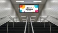 Modern subway station with colorful digital billboard and escalators Royalty Free Stock Photo