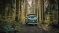 Green combi van driving through a forest