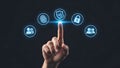 A hand interacting with digital security icons on a dark background Royalty Free Stock Photo