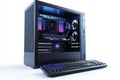 A sleek gaming computer setup with vibrant led lighting and a backlit keyboard isolated on white background Royalty Free Stock Photo