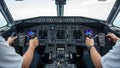 Pilots operating advanced aircraft cockpit Royalty Free Stock Photo