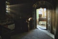 Interior of Stavropoleos Church with carved wooden doors and dramatic sun rays entering sacred space in Bucharest Romania Royalty Free Stock Photo