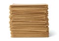 Stack of crumpled brown paper sheets arranged neatly on a flat surface Royalty Free Stock Photo