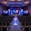 Modern conference hall with advanced lighting and visuals Royalty Free Stock Photo