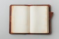 The image depicts a notebook from above, with nothing written in it, set against a white backdrop Royalty Free Stock Photo