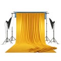 Photography Studio Setup with Yellow Fabric Backdrop and Lighting Equipment background Royalty Free Stock Photo