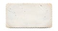The reverse side of an old and worn out postage stamp isolated on a white background Royalty Free Stock Photo