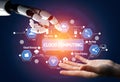 Futuristic Concept Illustrating Cloud Computing with Robotic Hand Interacting with Digital Interface Symbols Royalty Free Stock Photo