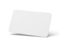 A blank white rectangular card standing upright against a white background. isolated on white background Royalty Free Stock Photo