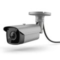 Modern security camera mounted on wall Royalty Free Stock Photo