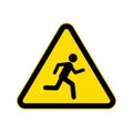 A person running inside a triangular warning sign symbol Royalty Free Stock Photo