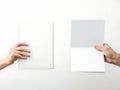 Minimalist display of paper sheets against white background Royalty Free Stock Photo