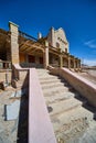 Desert ghost town staircase leading to abandoned train station Royalty Free Stock Photo