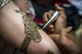 Image detail of henna being applied to arm Royalty Free Stock Photo