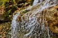 Detail of waterfall water flowing over edge blurred Royalty Free Stock Photo