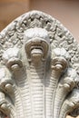 Image of details in the King palace of Cambodia. Detail of the architecture. Naga sculpture. Sacred snake with many heads.
