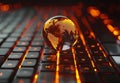 An image of a digital globe on a keyboard, depicting a global network with a world map and internet connections Royalty Free Stock Photo