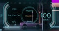 Image of digital interface with charging text over electric car driving