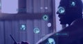 Image of digital screens with data over hands of african american man using smartphone Royalty Free Stock Photo