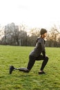 Image of disabled athletic girl in sportswear, doing sports and Royalty Free Stock Photo