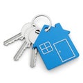Blue house-shaped keychain with a set of keys attached Royalty Free Stock Photo