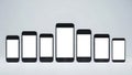 Evolution of smartphones showing various models in a chronological sequence Royalty Free Stock Photo