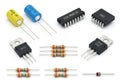 Assorted electronic components including capacitors, resistors, transistors, and ics Royalty Free Stock Photo