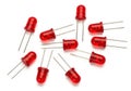 Assorted red light-emitting diodes with two long connecting wires each Royalty Free Stock Photo