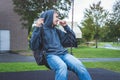 Happy teenager on a swing. Royalty Free Stock Photo