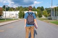 Teenager walking to school. Royalty Free Stock Photo