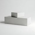 Two concrete blocks stacked in a minimalist arrangement against a plain background Royalty Free Stock Photo