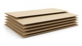 Stack of light brown corrugated cardboard sheets neatly arranged Royalty Free Stock Photo